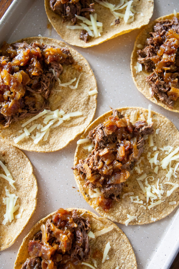 Crispy Beer Braised Beef Tacos with Chipotle Honey and Bacon Jam